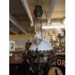 A Victorian hanging oil lamp with shade,.