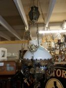 A Victorian hanging oil lamp with shade,.