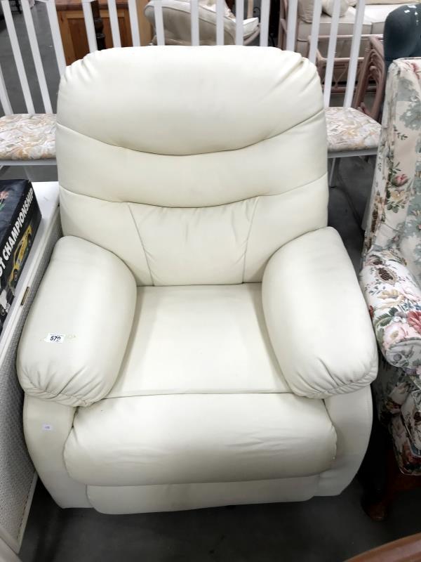 A white leather arm chair