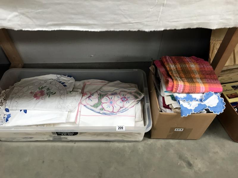 2 boxes of linen including tablecloths, doilies etc.