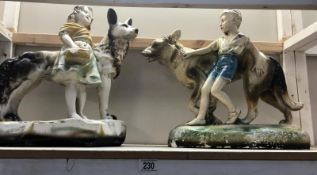 A pair of 1930's chalk figures of children with dogs