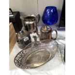 A quantity of silver plate including teaware, basket, jug etc.