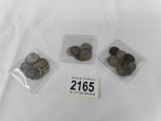A quantity of Victorian and pre 1947 silver 3d bits, approximately 50 grams.
