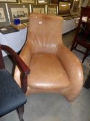 A 'Moreno' brown leather chair.