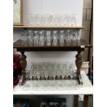 Over 6 dozen small wine glasses and over 2 dozen large wine glasses by Luminarc,