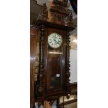 A mahogany Vienna wall clock.