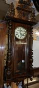 A mahogany Vienna wall clock.