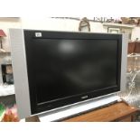 A Philips HD ready flat screen TV - in working order - no remote or leads but good picture