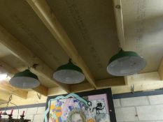 3 metal industrial ceiling lights.