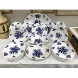 A quantity of vintage blue and white plates