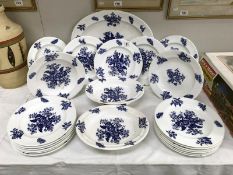 A quantity of vintage blue and white plates
