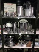 3 shelves of stainless steel kitchenware