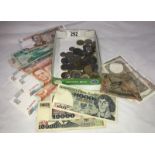 A mixed lot of coins and banknotes