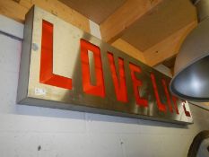 A 'Love Life' sign.