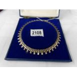A 9ct gold cased necklace, approximately 16 grams.