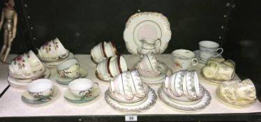 A shelf of tea sets etc.