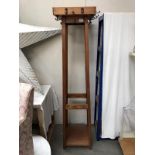 An Edwardian pine coat stand
