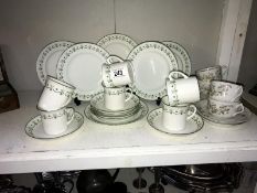 An 8 piece Limoge tea set and an 18 piece Foley art china tea set (6 cups, saucers,