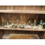 A quantity of brassware including chamber candlesticks, bell, jugs, horse brasses etc.