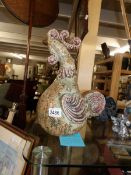 A studio pottery figure of a chicken.