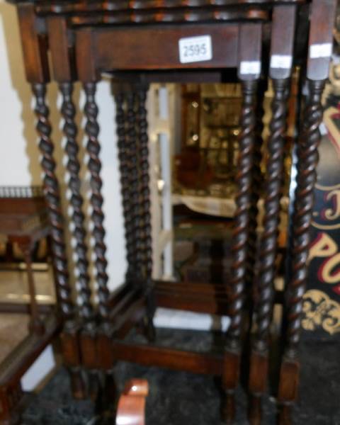 A 1930's nest of oak barley twist tables.