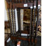 A 1930's nest of oak barley twist tables.