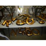 A quantity of large gilded and silvered letters.