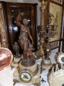 A 3 piece marble and gilt clock garniture comprising clock surmounted figure with child and 2