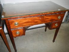 A mahogany dressing table base.