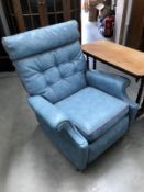 A BLUE VINYL Parker Knoll manual reclining chair