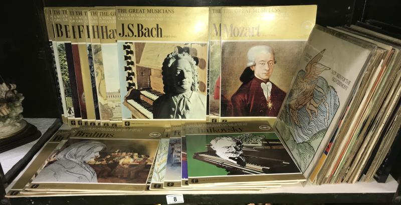 A shelf of mainly classical music 78 records including approximately 20 week by week studies of