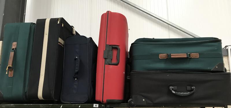 6 large suitcases