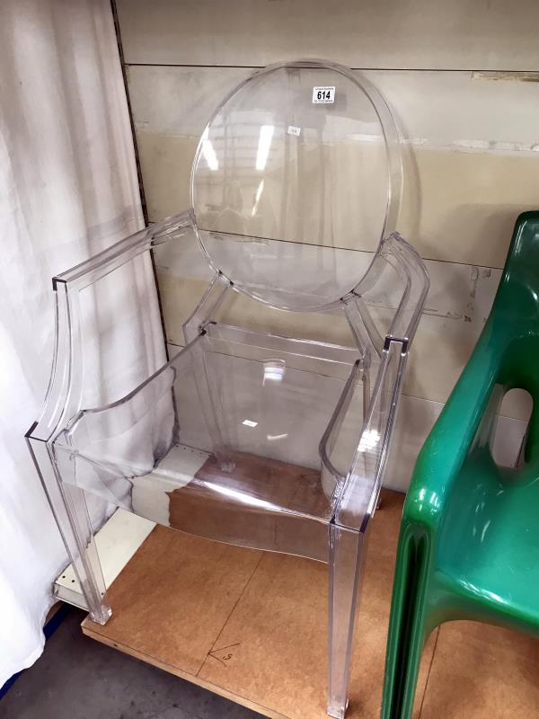 A Louis Ghost StarkKartell transparent plaster dining chair