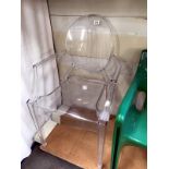 A Louis Ghost StarkKartell transparent plaster dining chair