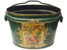 An old green painted bucket with oriental scene.