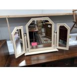 A dressing table mirror