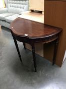 A mahogany effect D end hall table