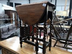 A mahogany gateleg table with barley twist legs