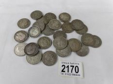 Approximately 300 grams of silver florins.