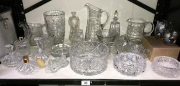 A mixed lot of cut glassware including water jugs, glass basket, bowls etc.