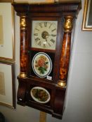 A floral decorated wall clock.