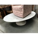 An Eero Saarinen oval coffee table by Knoll