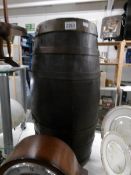 An oval shaped brass bound barrel.