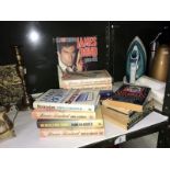 A quantity of hard back and paperback books including James Bond