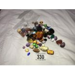 A quantity of glass and real gemstones