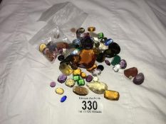 A quantity of glass and real gemstones