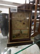 A 19th century mantel clock.