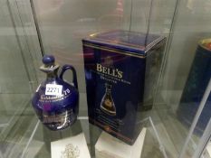 2 Bell's whisky decanters for Queen Elizabeth II Golden Jubilee and 70th birthday, with contents.