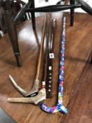 3 walking sticks including horn/antler handles and a shoe horn