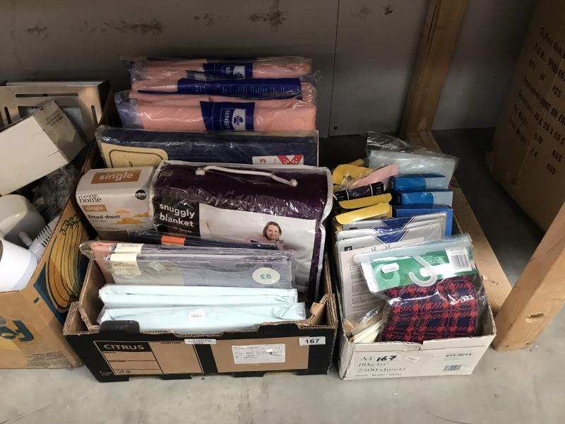 2 boxes of fabric including sheets, nylons etc.